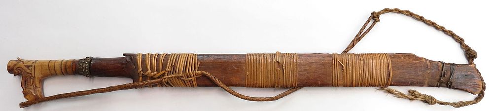 Lot 355: A DAYAK HEADHUNTER MANDAU SWORD