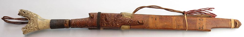 Lot 248: A DAYAK HEADHUNTER MANDAU SWORD