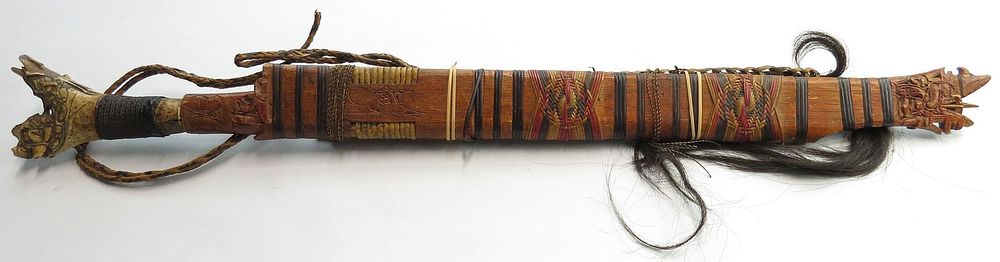 Lot 284: A DAYAK HEADHUNTER MANDAU SWORD