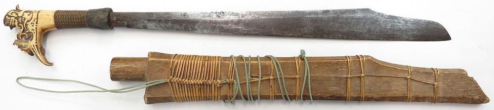 Lot 302: A DAYAK HEADHUNTER MANDAU SWORD