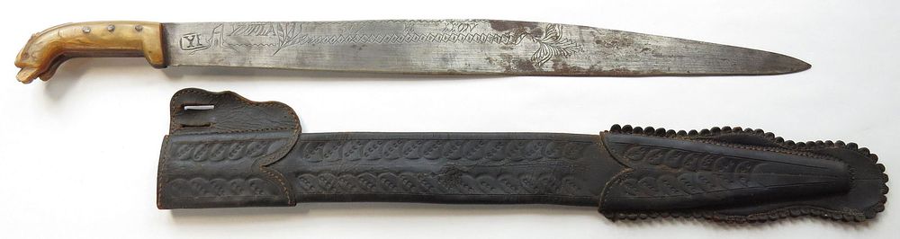 Lot 305: A MEXICAN REVOLUTIONARY WAR-ERA MACHETE SWORD