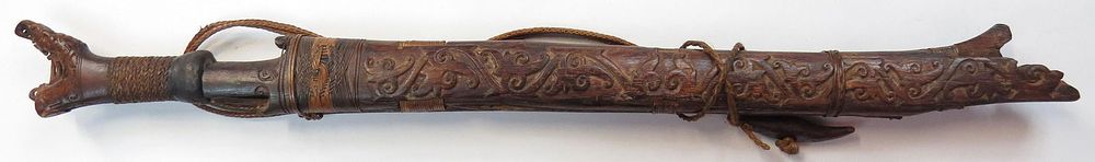Lot 293: A DAYAK HEADHUNTER MANDAU SWORD