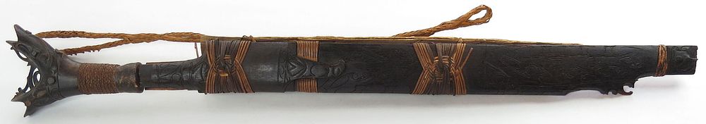 Lot 364: A DAYAK HEADHUNTER MANDAU SWORD