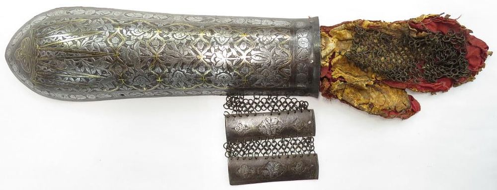 Lot 203: A PERSIAN BAZUBAND ARMGUARD ARMOR