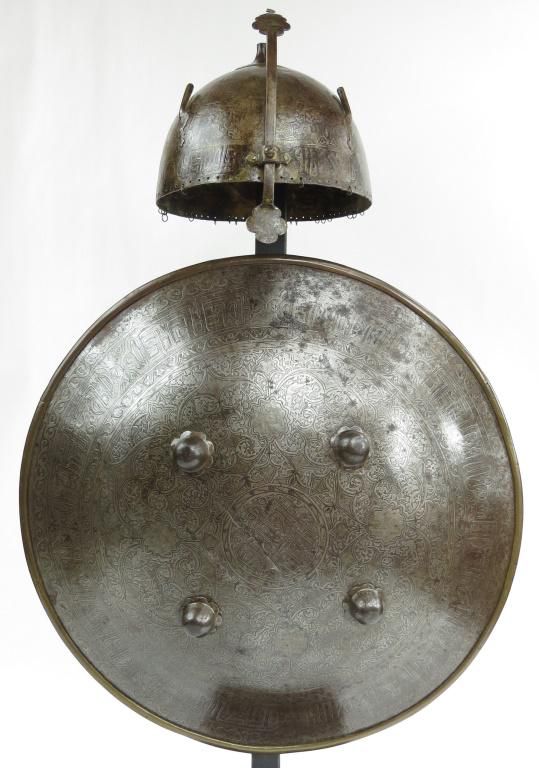 Lot 304: A PERSIAN QAJAR ERA HELMET & SHIELD