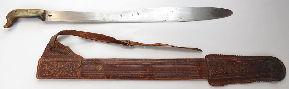 Lot 200: A MEXICAN REVOLUTIORY WAR-ERA SWORD MACHETE