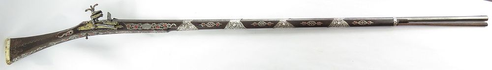 Lot 293: A FINE ALGERIAN MIQUELET MUSKET