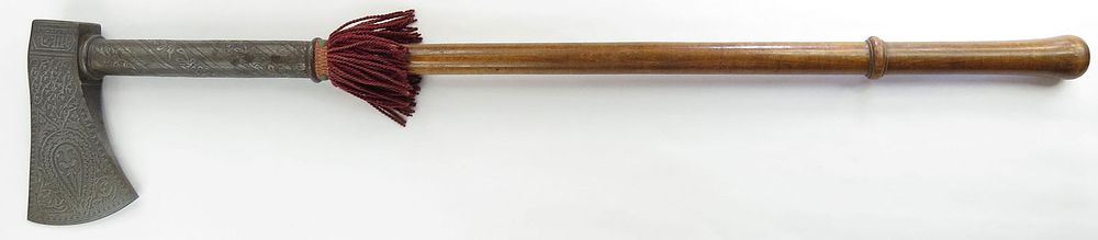 Lot 342: A PERSIAN CEREMONIAL BATTLEAXE