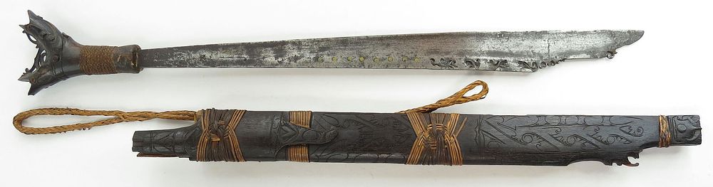 Lot 364: A DAYAK HEADHUNTER MANDAU SWORD