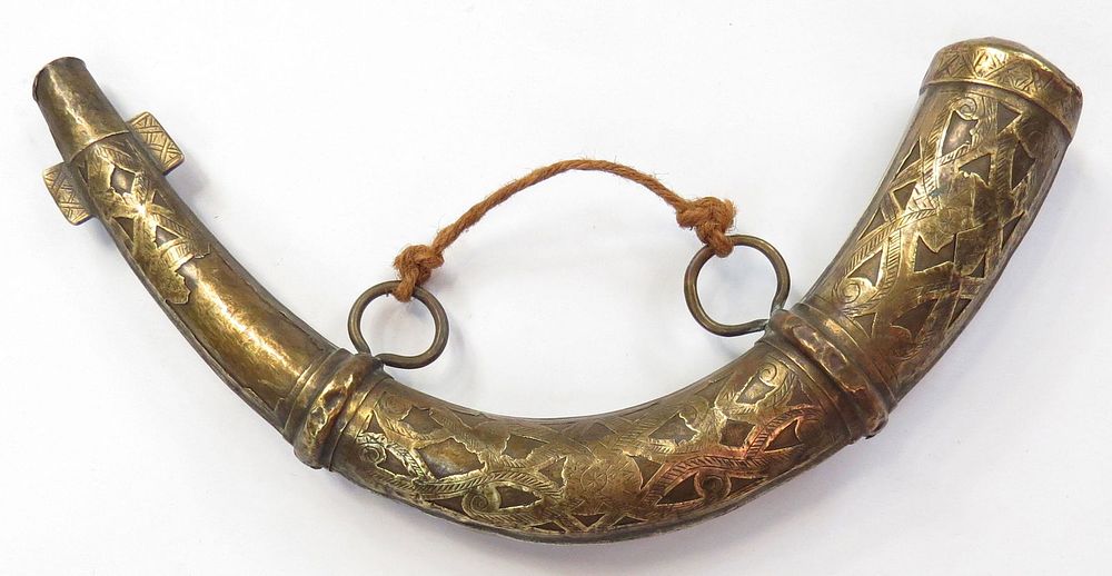 Lot 568: A MOROCCAN POWDER HORN