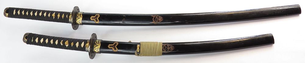 Lot 601: A PAIR OF REPLICA JAPANESE SWORDS
