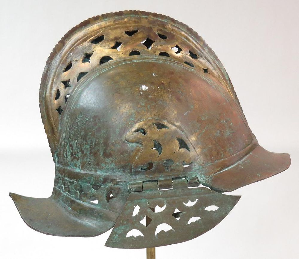 Lot 281: A RARE MORO HELMET
