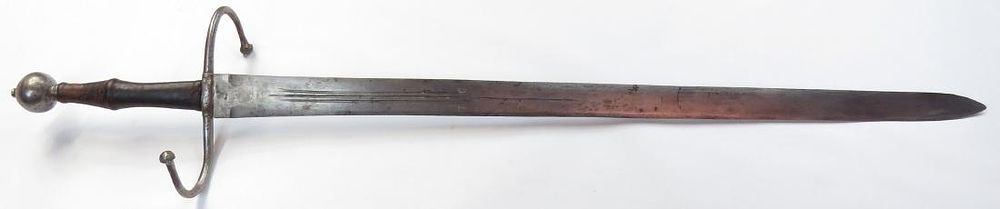 Lot 356: A GERMAN HAND AND A HALF SWORD