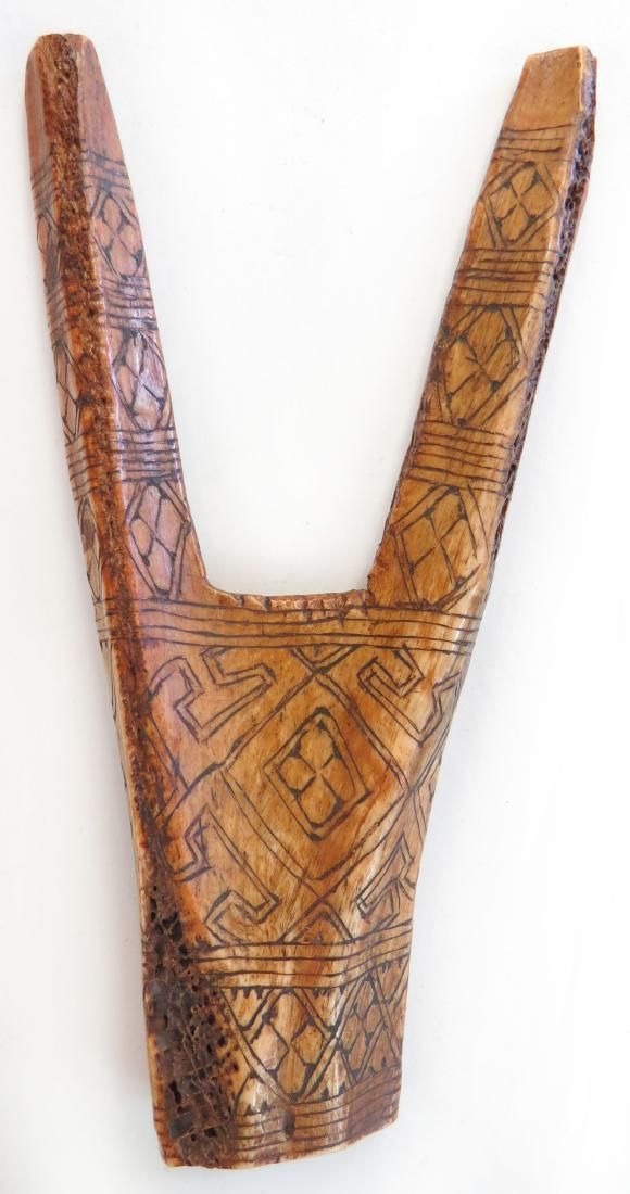 Lot 439: A TIMORESE SLINGSHOT