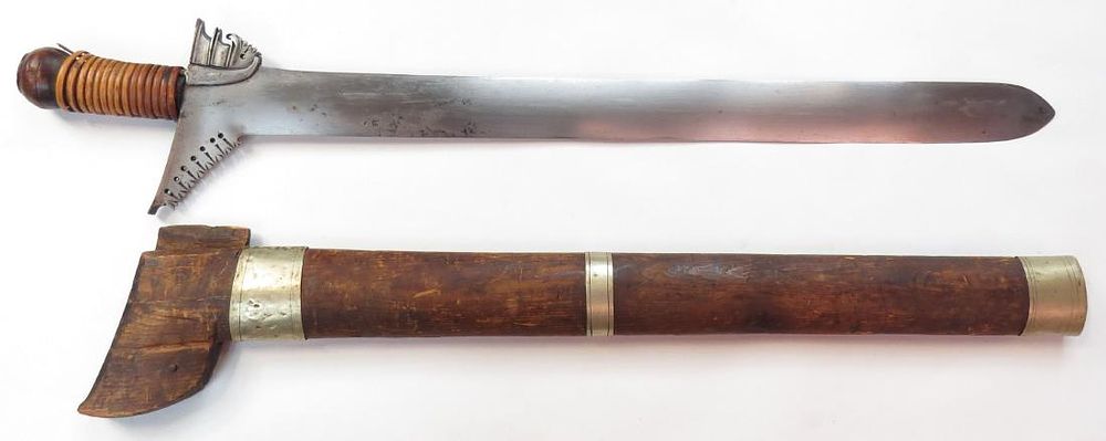 Lot 550: A MORO KRIS SWORD