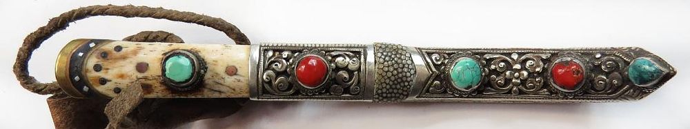 Lot 184: A TIBETAN BELT DAGGER