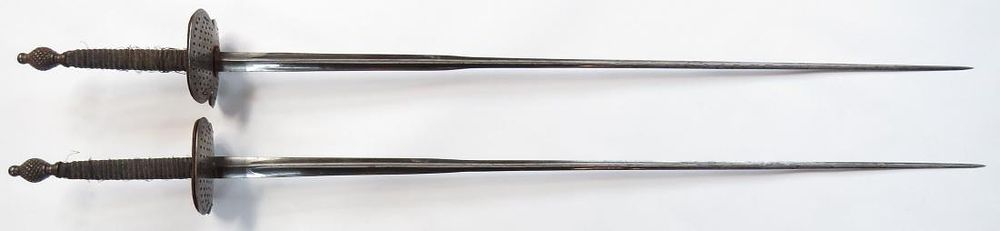 Lot 223: A RARE PAIR OF CONTINENTAL DUELLING SWORDS