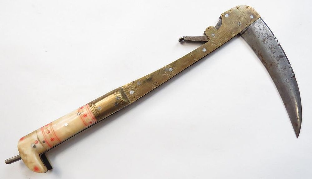 Lot 248: AN AFGHAN LOHAR FOLDING AXE