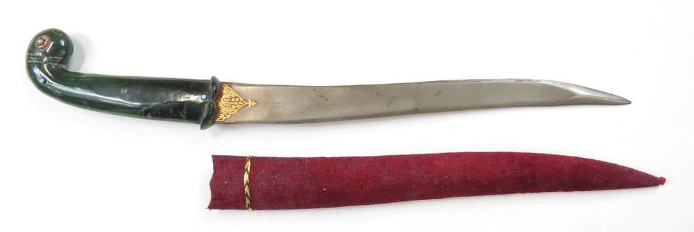 Lot 254: AN INDIAN JADE-HILTED KHANJAR DAGGER
