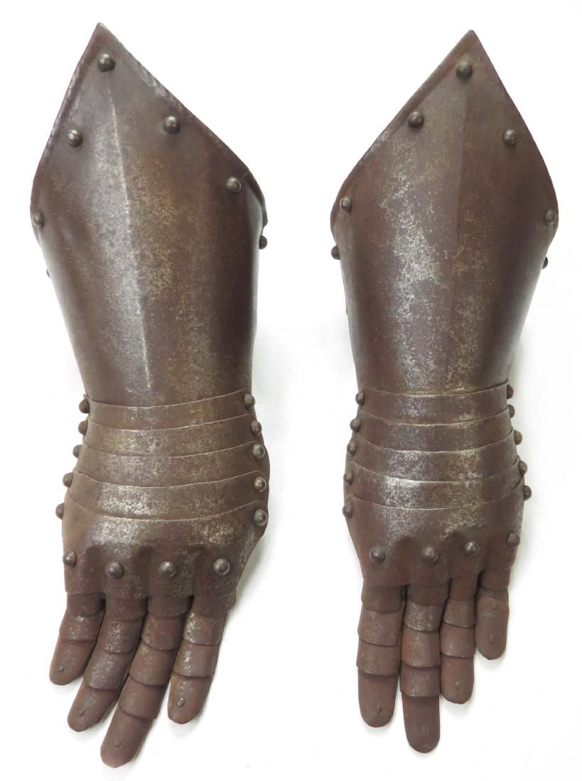 Lot 339: A PAIR OF ARMOR GAUNTLETS