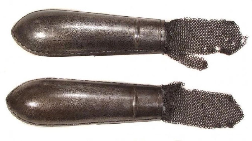 Lot 192: A PAIR OF INDIAN BAJUBAND ARMOR ARMGUARDS
