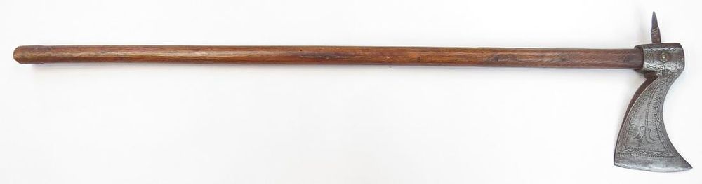 Lot 196: AN INDIAN HORSEMAN’S AXE