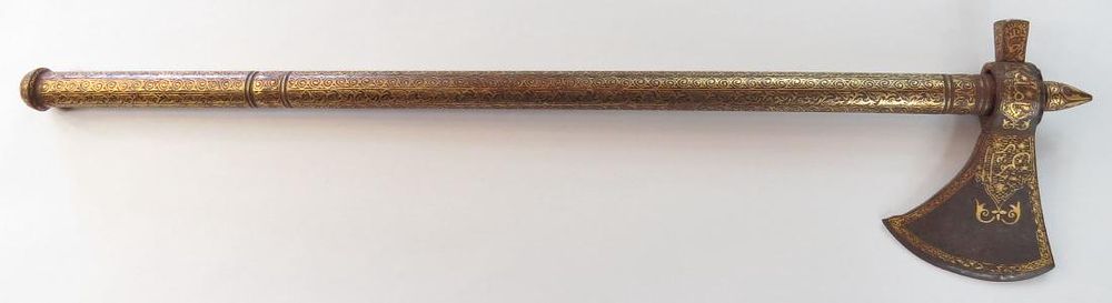 Lot 231: AN INDIAN TABARZIN SADDLE AXE