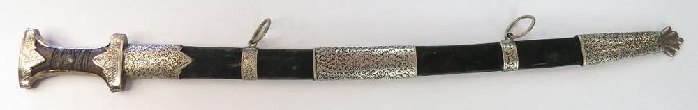 Lot 309: A MOROCCAN GENOUI SWORD