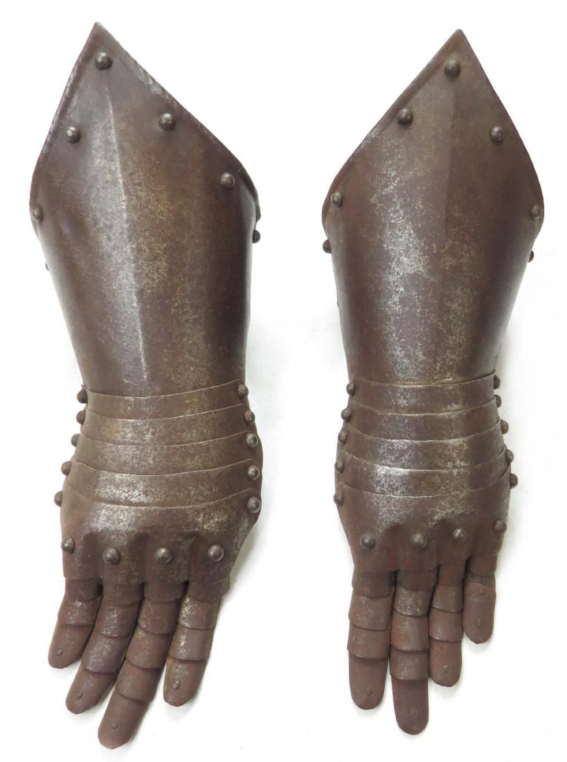 Lot 339: A PAIR OF ARMOR GAUNTLETS