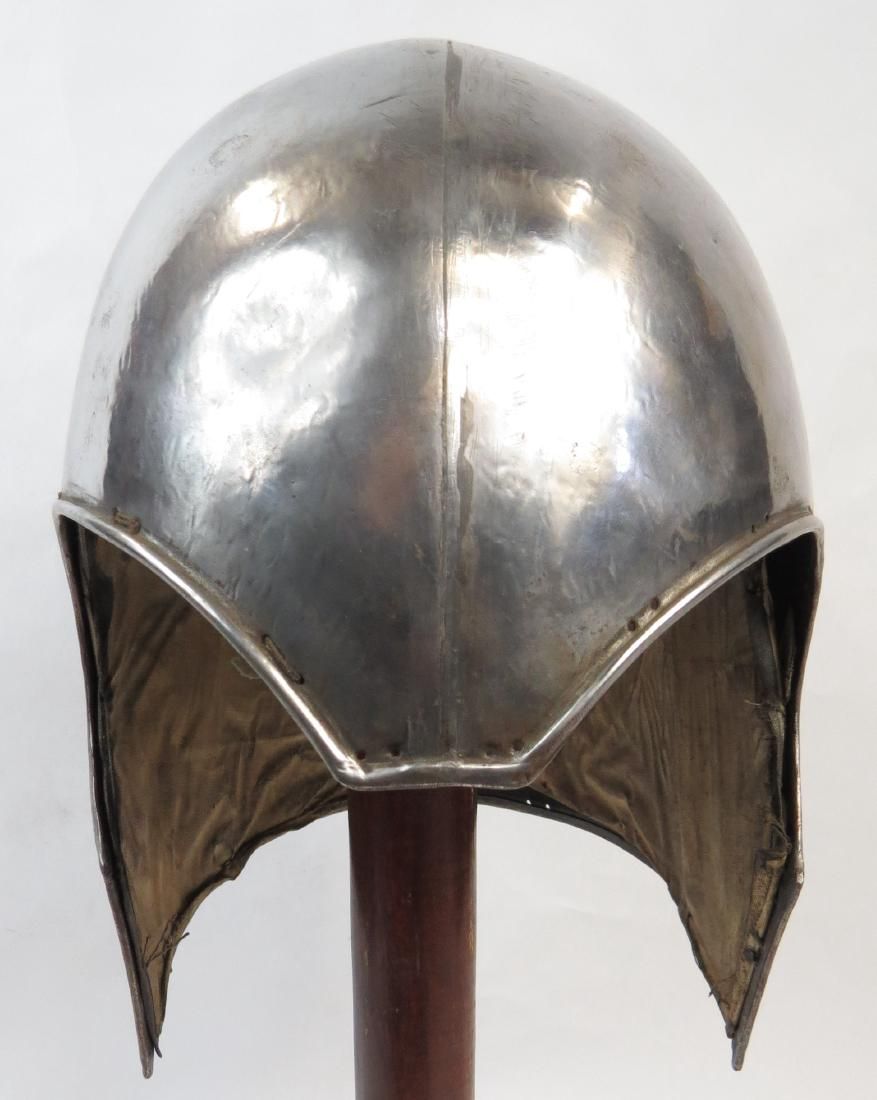 Lot 495: A VICTORIAN-ERA CORINTHIAN HELMET