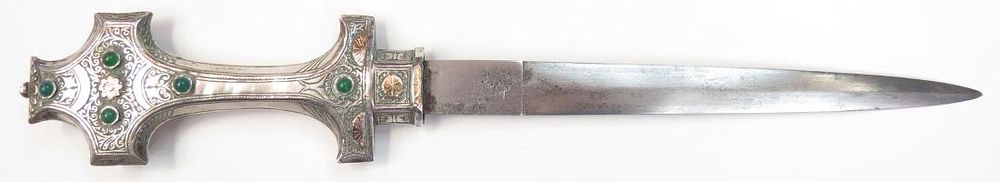 Lot 499: A MORROCAN KOUMIYYA DAGGER