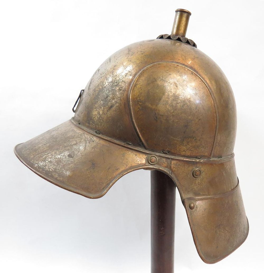 Lot 524: A VICTORIAN-ERA BEOETIAN HELMET