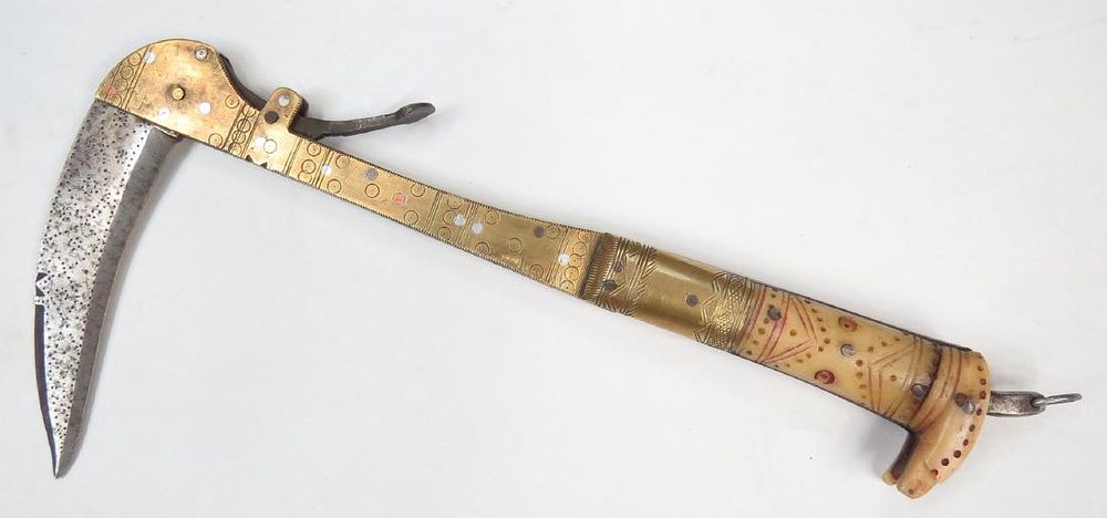 Lot 165: AN AFGHAN LOHAR FOLDING AXE