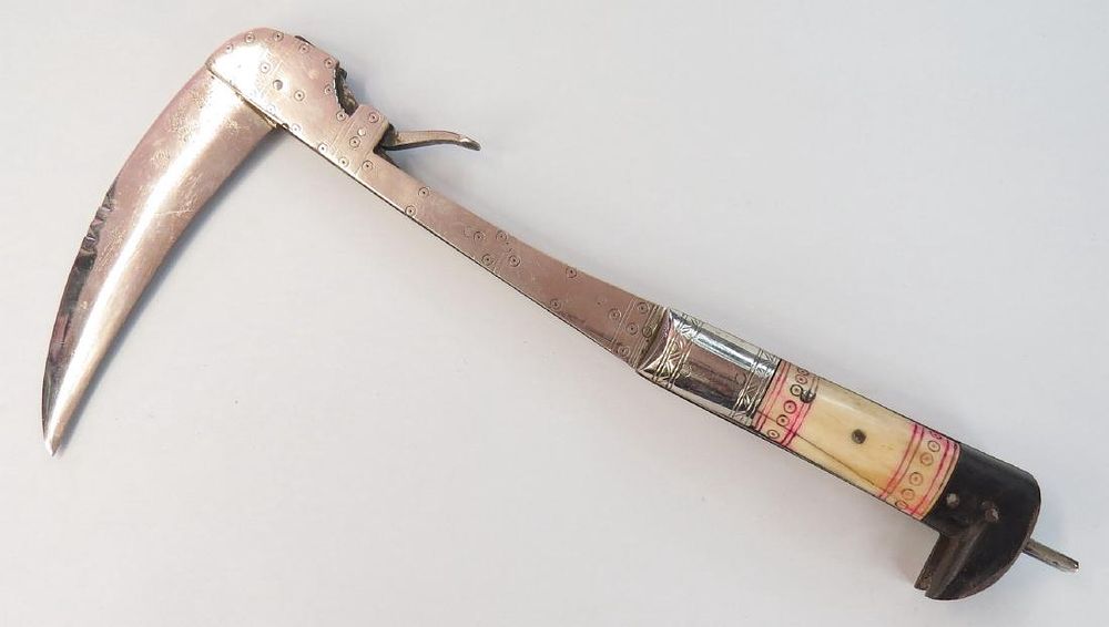 Lot 193: AN AFGHAN LOHAR FOLDING AXE