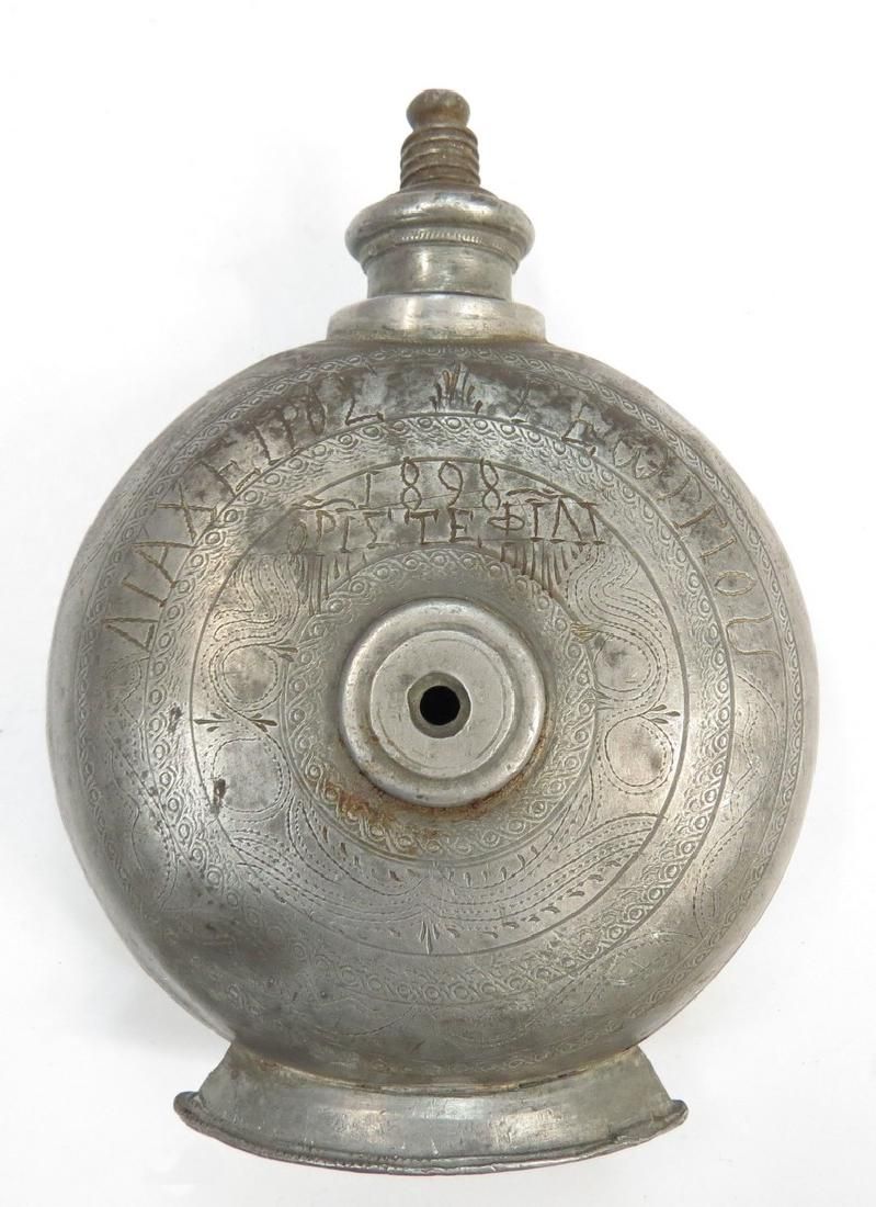 Lot 203: A GREEK POWDER FLASK