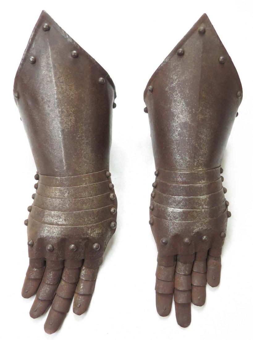 Lot 229: A PAIR OF ARMOR GAUNTLETS