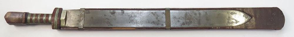 Lot 233: A BHUTANESE SWORD