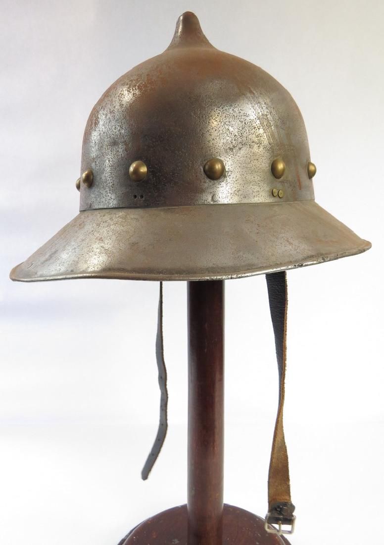 Lot 241: A VICTORIAN-ERA KETTLE HELMET