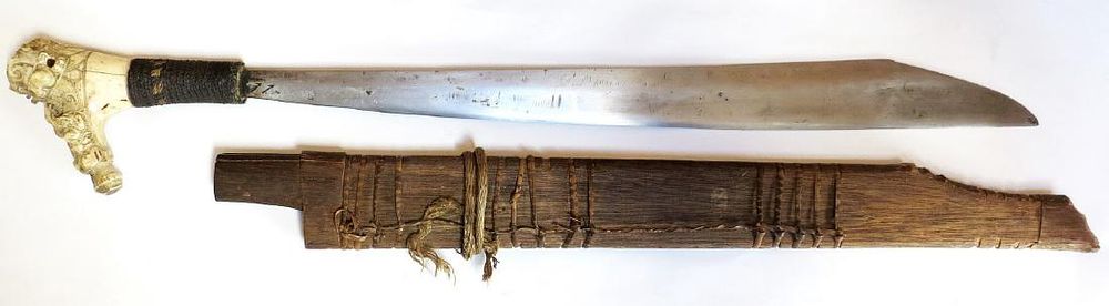 Lot 408: A DAYAK MANDAU HEADHUNTER SWORD