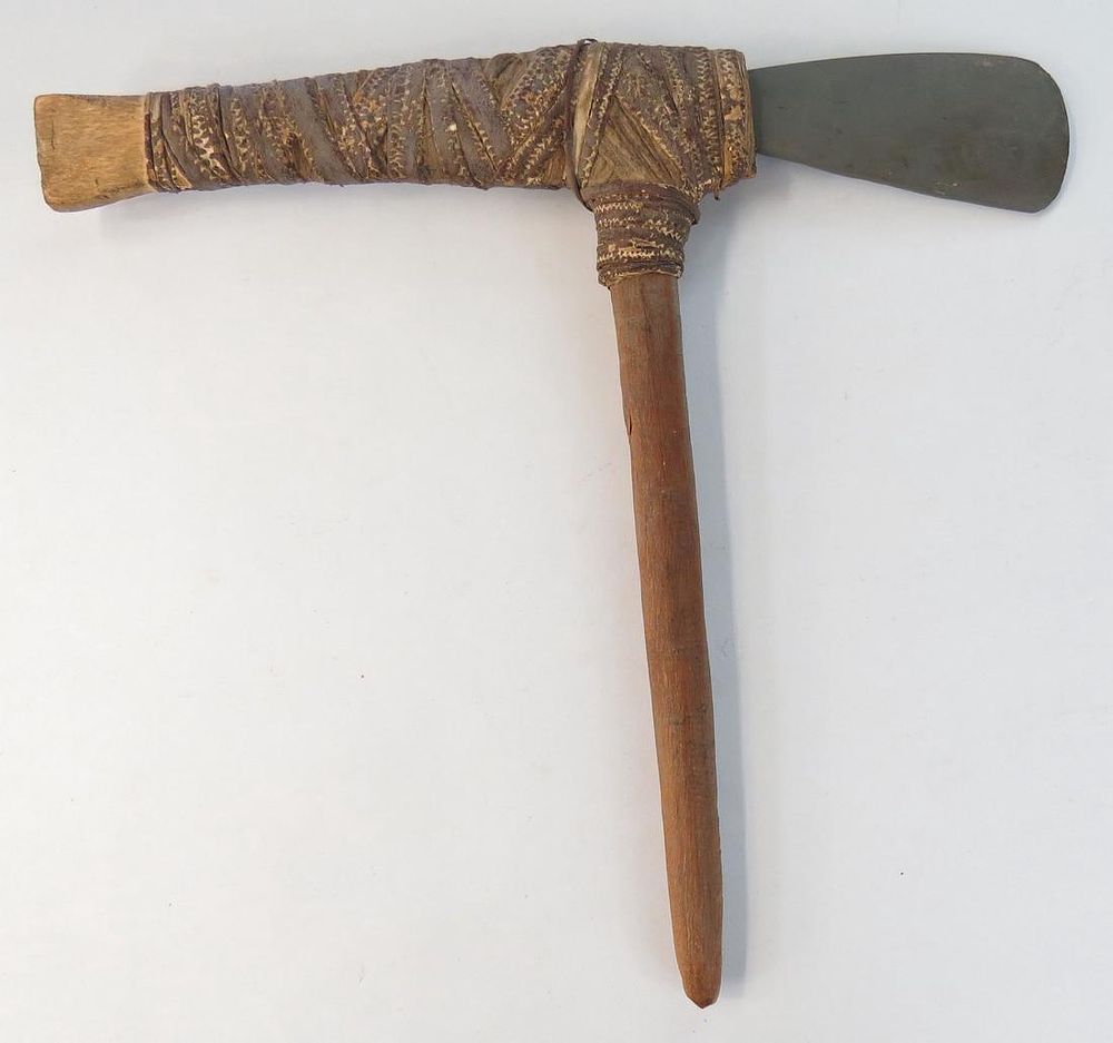 Lot 460: A RARE PAPUA NEW GUINEA STONE AXE