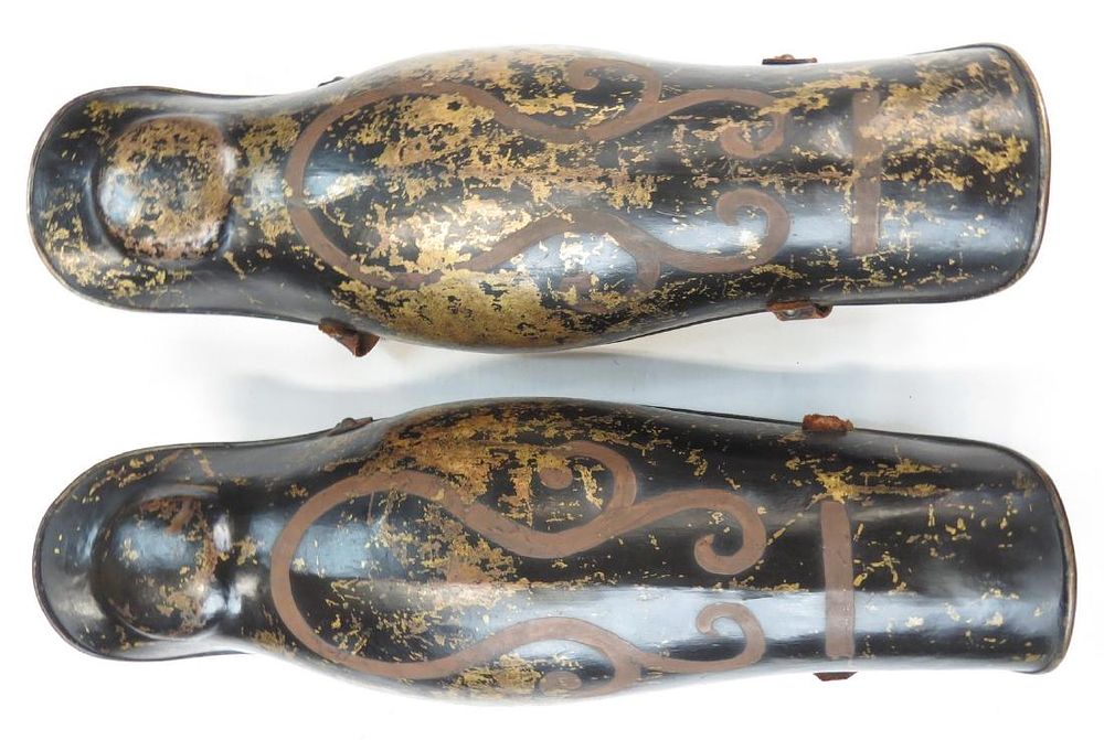 Lot 487: A PAIR OF VICTORIAN-ERA ARMOR GREAVES