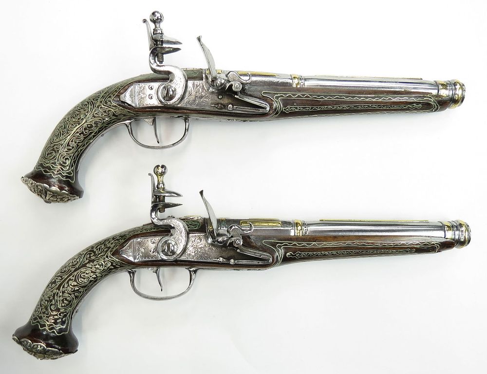 Lot 244: A FINE PAIR OF OTTOMAN FLINTLOCK PISTOLS