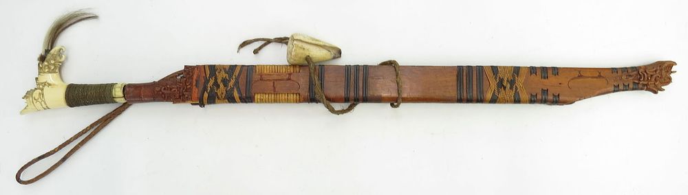 Lot 313: A FINE DAYAK HEADHUNTER PARANG IHLANG MANDAU SWORD