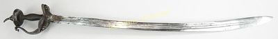 A CENTRAL INDIAN TULWAR SWORD. An early example, the well-wrought Indian baskethilt with 