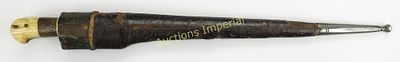 AN AFGHAN CHOORA DAGGER. A large example, the grips of bone and chamfered edge. In its 