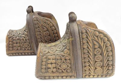 A RARE PAIR OF CHILEAN HUASO STIRRUPS. Each carved of a single section of wood and incised in 