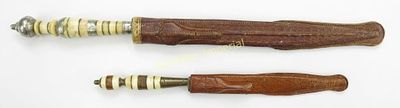 TWO BRAZILIAN FACON DAGGERS. Of characteristic form, with segmented bone and silver grip and 