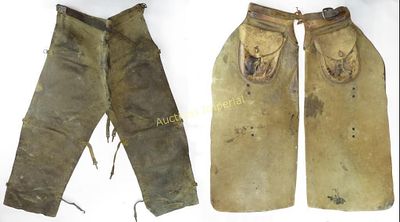TWO PAIRS OF AMERICAN WESTERN CHAPS. Of buck hide, the first with patch pockets and leather 