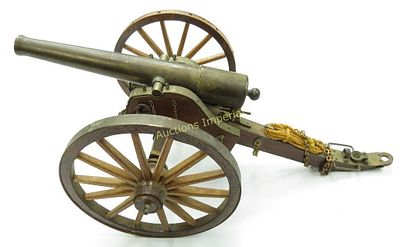 A BLACK POWDER CANNON. A large, finely-detailed example with well-turned bronze barrel marked at 