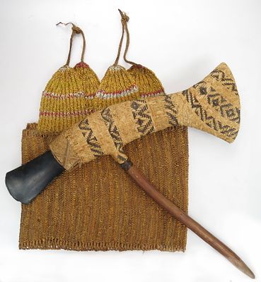 A RARE PAPUA NEW GUINEA WOVEN ARMOR AND STONE AXE. The armor Dani People, of characteristic 